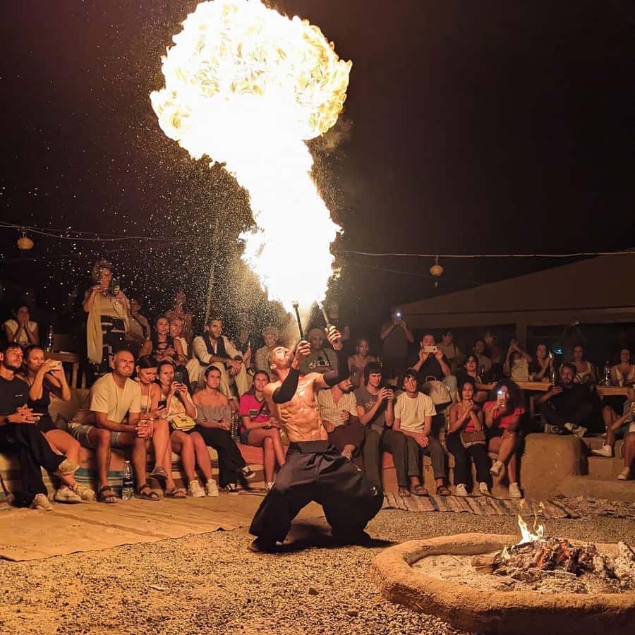 Fire-breathing performer at desert dinner show